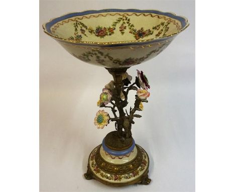 A Victorian Style Continental Ceramic & Gilt Metal Centrepiece, Decorated with encrusted flowers and a Stag to the column sup