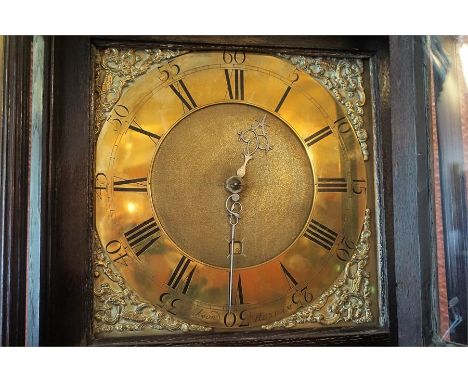 An 18th Century Oak Longcase Clock By Jackson Of Hexham, with broken swan pediment above a glazed door enclosing a 11 inch br