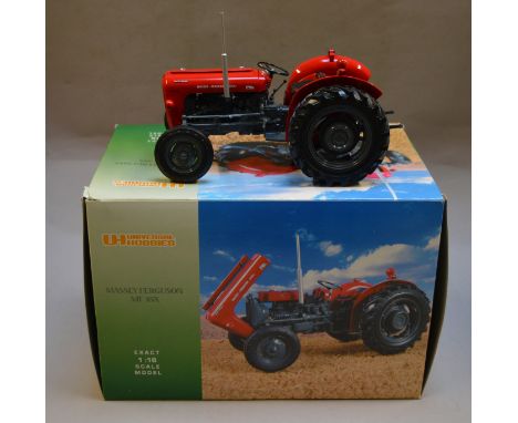 2 Universal Hobbies tractor models: Massey Ferguson MF 35X and 135, (yellow tractor missing exhaust) boxed.