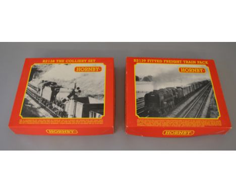 OO Gauge. Hornby. 2 x train packs. R.2139 Fitted Freight, BR 9F class with 6 rolling stock & R.2138 The Colliery Set, BR 4F c