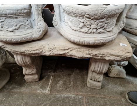 A concrete garden bench 