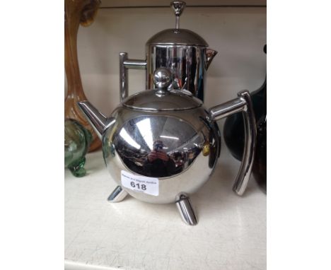Modern stainless steel teapot and coffee jug 