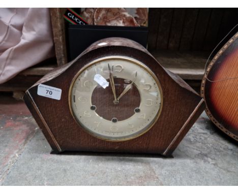 A Westminster chime mantle clock with key and  pendulum 