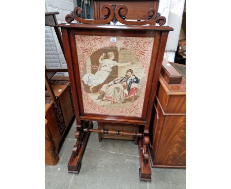 A 19th Century rosewood firescreen, the tapestry depicting Charles I, height 19cm.