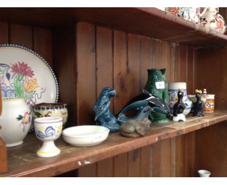 9 items of Poole pottery, Dartmouth glug jug etc 