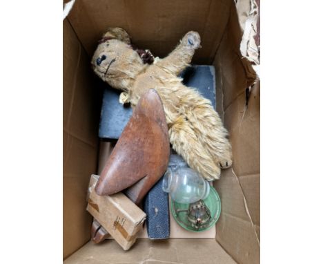 A metal cash cash tin with key, a vintage childs teddy bear, a small paraffin lamp, a shoe last, rosary bead necklace and hym