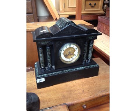 A black slate and marble mantle clock with pendulum and key, by H L Brown &amp; Sons, Sheffield and Paris. 