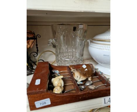 A mixed lot comprising a cut glass champagne bucket, a Poole rabbit and a Beswick rabbit and a collection of souvenir spoons.