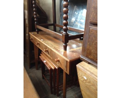 A mid 20th century walnut dressing table together with a teak and tile top nest of tables. 