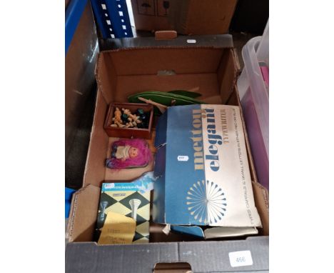 A box of toys to include vintage tin typewriter, pond yacht, chess pieces and doll 