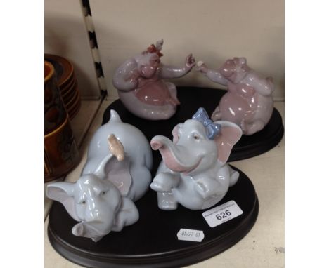 Two pairs of Nao elephants on stand, Nao figure, Carlton crested figure and a Royal Doulton Images ornament 