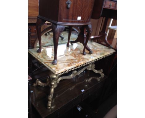 Various items of furniture; an Edwardian inlaid mahogany dressing table, a brass and onyx coffee table, a mahogany sofa table