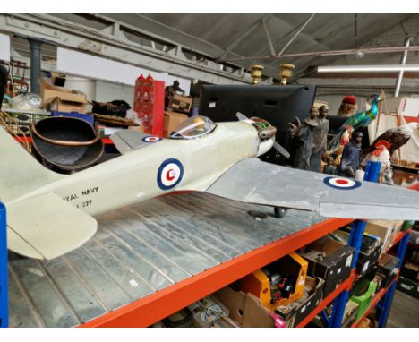 A large remote controlled model airplane with petrol engine. No controller 