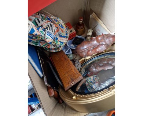 A box of misc items including gilt framed circular mirror, jasperware pottery, glass paperweights, saw, barometer, Brownie ca