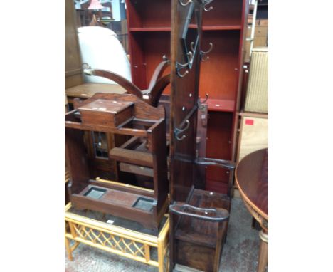 Various items of furniture; a 1920s oak hallstand, an oak stick stand of a similar age, a mahogany dining table, a mahogany b
