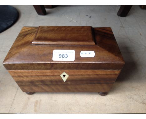 A 19th century style walnut sarcophagus tea caddy. 