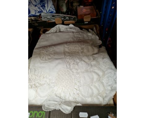 A box of vintage linen and lace. 