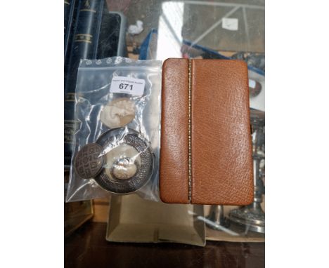 A mixed lot comprising a leather case, two cameos, a silver plated bangle, a hallmarked silver photograph frame and a vintage