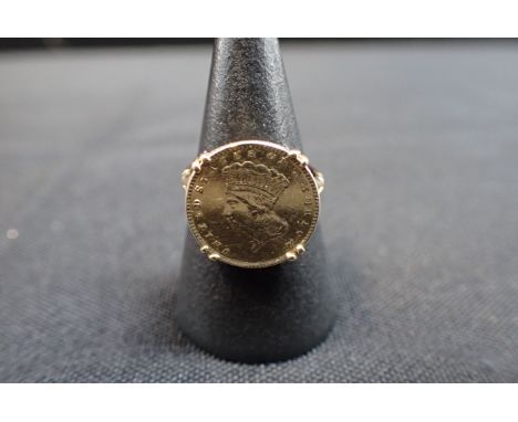 AN 1862 DOLLAR, MOUNTED AS A RING 