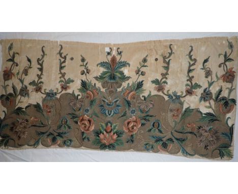 AN 18TH CENTURY EMBROIDERED PANEL possibly fragment of bed hanging 104 x 47cms (damaged,couched onto a piece of cotton)