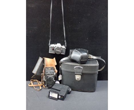 A VINTAGE RICOH AUTO 66 CAMERA cased, and an Olympus OM 10, with accessories, in carrying case