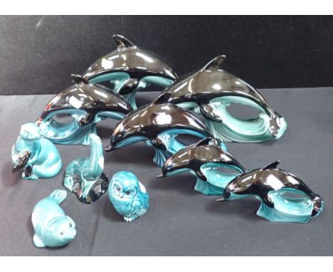 A COLLECTION OF POOLE POTTERY BLUE DOLPHINS and sealions, and an owl (10)