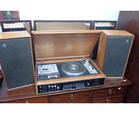 A VINTAGE DYNATRON CAVALCADE MUSIC CENTRE SRX 30B, with GOLDRING G 101 belt drive, tape deck, and a pair of Model LS 1428 spe