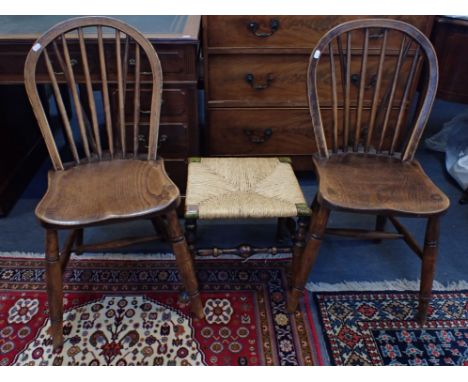 A HOOP-BACK WINDSOR CHAIR, STAMPED E.R.VIII beneath a Crown, and 'W (crown) K', another similar, and a George III rush-seat f