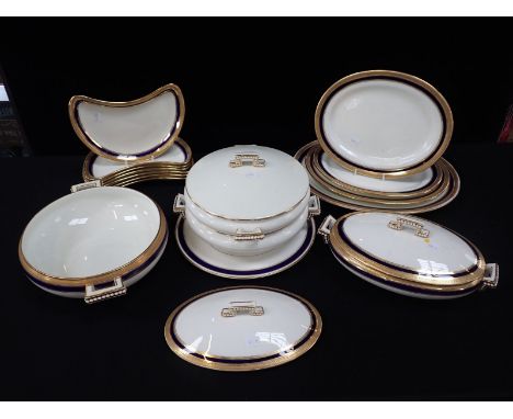 A QUANTITY OF CAULDON DINNER WARE with blue and gilt decoration (some gilt only), some retailed by Osler, London, and a simil