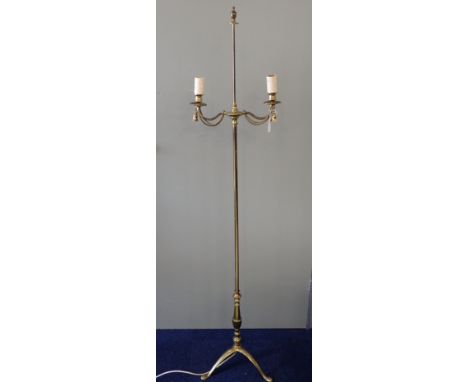 AN EDWARDIAN STYLE BRASS STANDARD LAMP with cast rope detail, and Benson inspired tripod base 155cm high