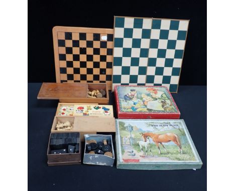 A COLLECTION OF VINTAGE WOODEN GAMES to include chess set, dominoes and others