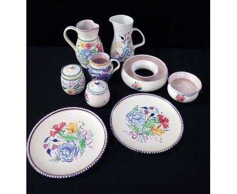 A COLLECTION OF POOLE POTTERY traditionally painted (9)