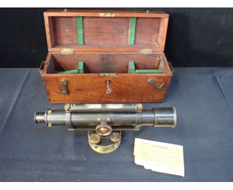 A VINTAGE THEODOLITE, OR 'FOUR SCREW LEVEL' in mahogany case (overhauled in August 1959)