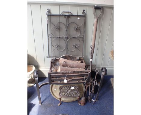 A CERNE VALLEY FORGE FIRE BASKET with some fire tools, a fire screen, brass tray, and a garden fork