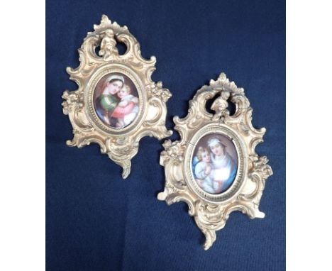 A PAIR OF 19TH CENTURY 'GRAND TOUR' TYPE CERAMIC PLAQUES convex, one painted with Raphael's Modonna, the other similar, both 