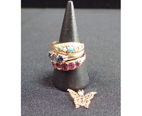 AN EDWARDIAN TURQUOISE AND DIAMOND RING with two other gold rings and a gold pendant