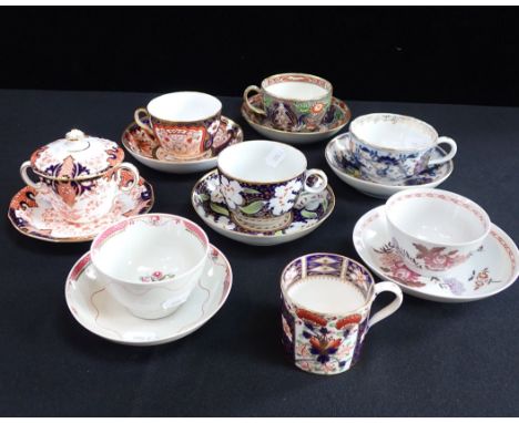 A ROYAL CROWN DERBY CHOCOLATE CUP, COVER AND SAUCER six other English cups and saucers and a Bloor Derby coffee can 