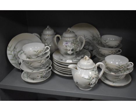 A Chinese eggshell part tea service having crane and bamboo design
