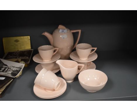 An art deco styled pink glaze part tea service by Wedgwood in the Blush Rose design