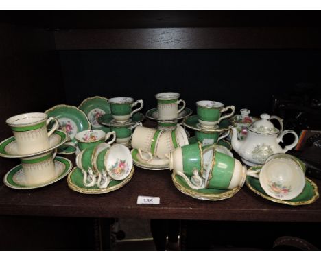 A part tea service by Crescent and a similar coffee servce