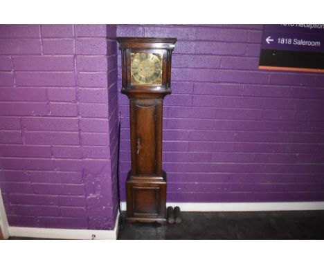 A good quality reproduction oak long case clock, in the manner of Titchmarsh &amp; Goodwin, the brass dial with Roman hours a