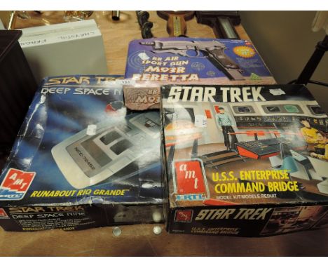 Two vintage sci fi plastic model kits including Star Trek Enterprise Command Bridge and Deep Space Nine both as new unmade