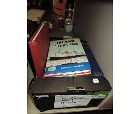 A box of books including vintage Biggles novel and model railway interest.