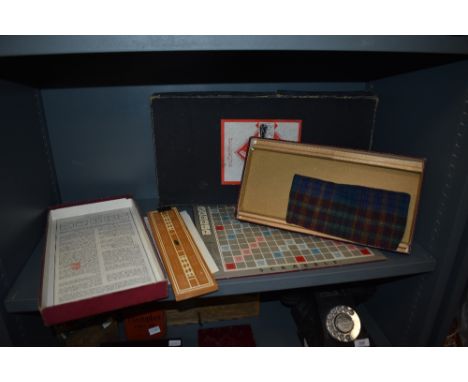 Two vintage board games including Monopoly and Scrabble