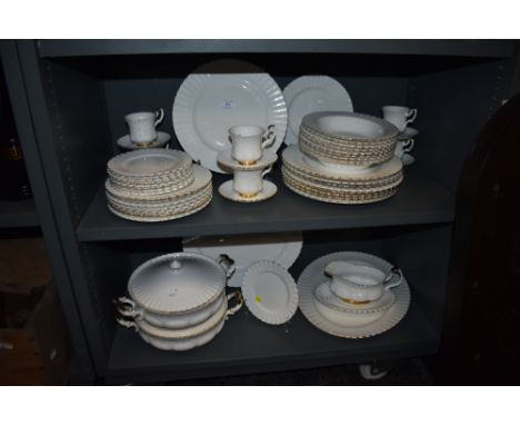A large part dinner and tea service by Royal Albert in the Val D'or design