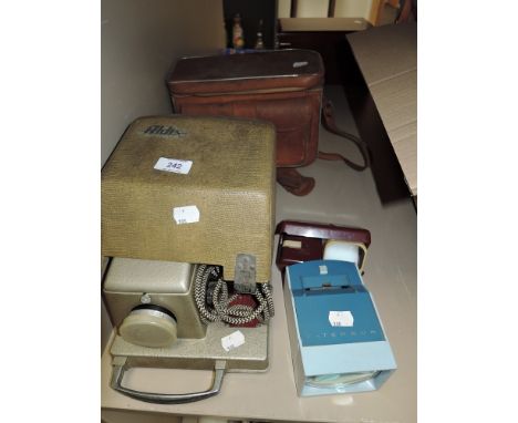A vintage photographic slide projector by Aldis and similar portable examples
