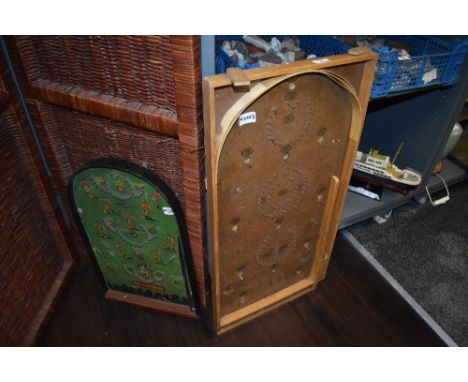 A vintage pin football and a bagatelle.