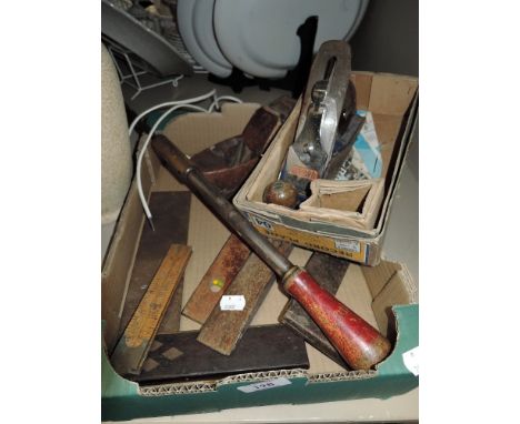 A selection of wood workers tools including block plane and set squares