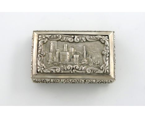 A Victorian silver 'castle-top' snuff box, Bamburgh Castle, by David Pettifer, Birmingham 1848, rectangular form, the hinged 