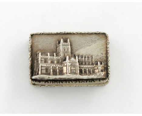 A Victorian silver 'castle-top' vinaigrette, Malvern Abbey, by Nathaniel Mills, Birmingham 1843, rectangular form, the hinged